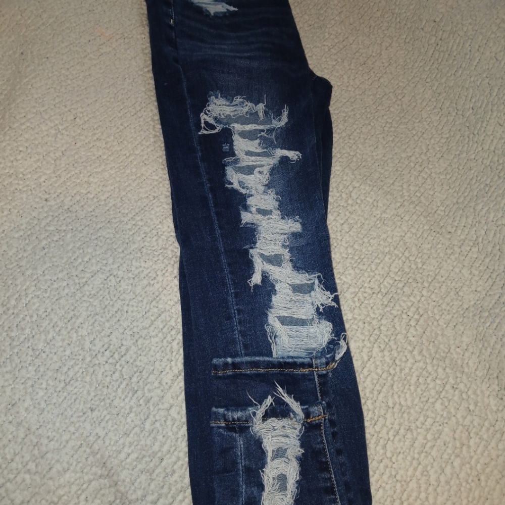 Distressed Blue Denim Jeans